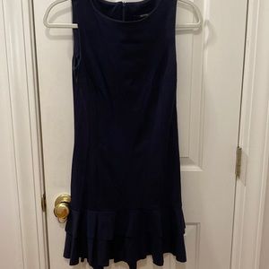 Little navy dress sleeveless little skirt at the bottom flares out so small